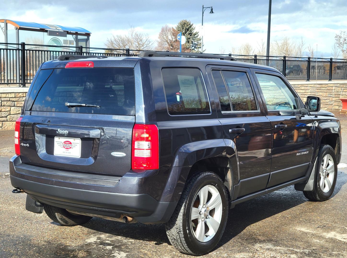 2014 Blue /Black Jeep Patriot Latittude (1C4NJRFB7ED) with an 2.4L I4 engine, 6 Speed Automatic transmission, located at 450 N Russell, Missoula, MT, 59801, (406) 543-6600, 46.874496, -114.017433 - Photo#4